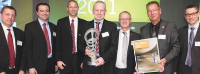 Dr Manfred Jagiella (centre) accepts the award with the Endress+Hauser management team